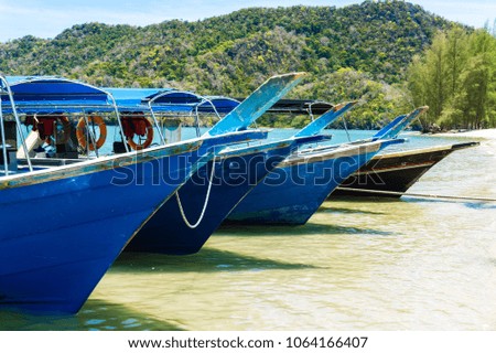 Wooden malaysian boats on the beach on tropical island, Langkawi island, Malaysia