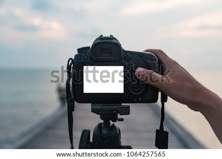 Blank screen of camera on sea background.
