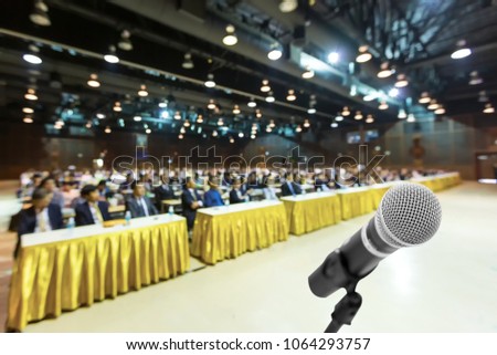 Microphone voice speaker with audiences or students in seminar classroom, lecture hall or conference meeting in educational business event for host, teacher, or coaching mentor.