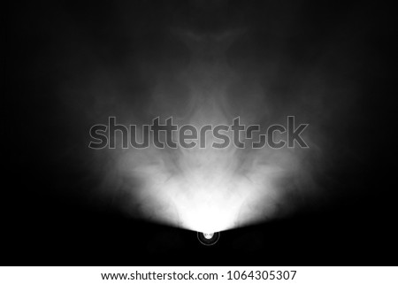 black and white color . projector beautiful spotlight . wide lens equipment for show presentation at night . smoke abstract background . digital monitor for multimedia teach . Royalty-Free Stock Photo #1064305307