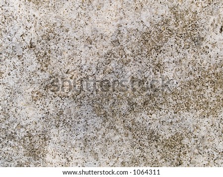 Stock macro photo of the texture of mottled stone.  Useful for layer masks or abstract background textures.