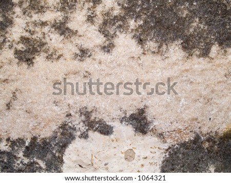 Stock macro photo of the texture of mottled stone.  Useful for layer masks or abstract background textures.