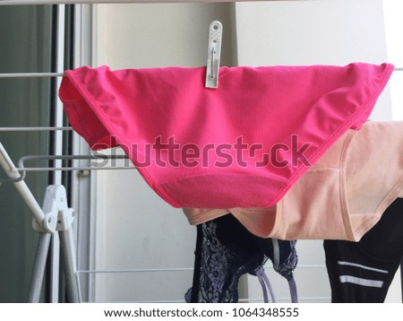 Panties of a women drying on the clothes line.
