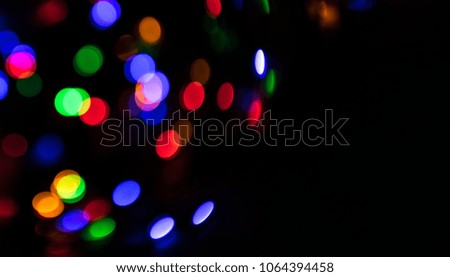 Bright festive background. Shining colored lights