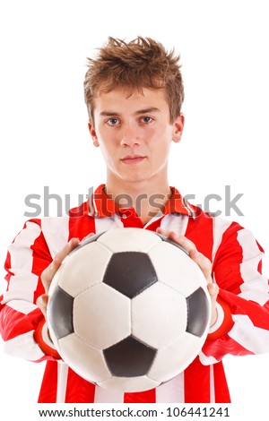 Soccer player holding a ball isolated on white background