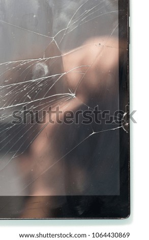 Tablet with a broken screen on a white background