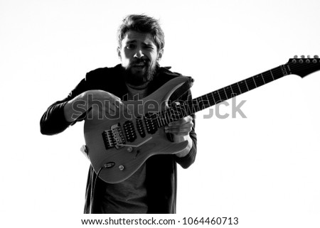  guitarist with electric guitar                              