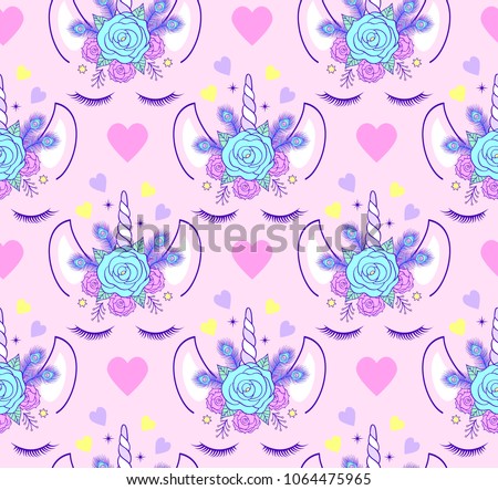 Seamless pattern with head of unicorn on pink background