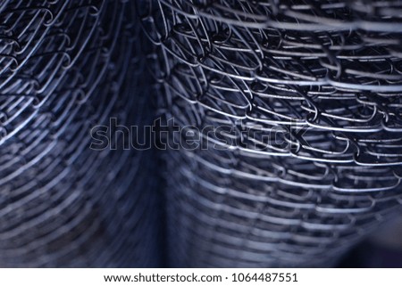 Metal mesh in roll. Building and metal structure background for your design.