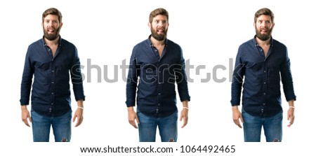 Young man with beard sticking out tongue at camera at sign of disobedience, protest and disrespect isolated over white background