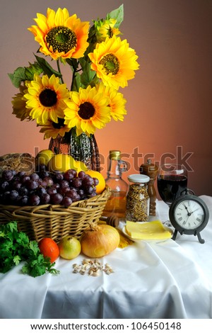 Sun flowers and pizza still life