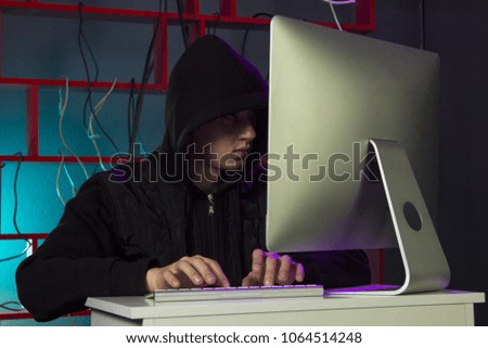 hacker near the computer