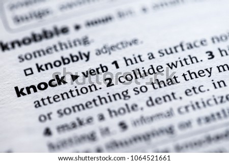 Close up to the dictionary definition of Knock
