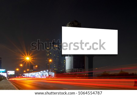 Blank billboard for outdoor advertising poster or blank billboard at night time with street light for advertisement.