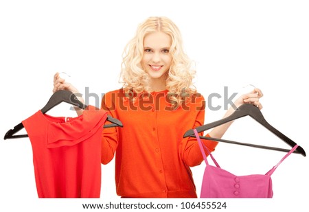 bright studio picture of beautiful teenage girl with clothes