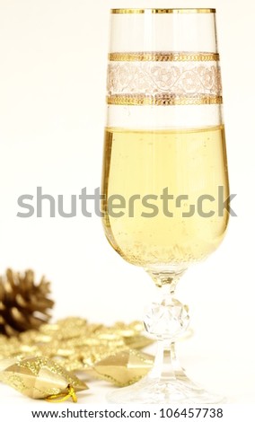 vintage glass with champagne ,  Christmas decorations