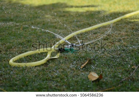 A picture of rotating water sprayer in high shutter speed
