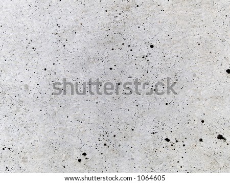Stock macro photo of the texture of discolored concrete.  Useful as a layer mask or abstract background.