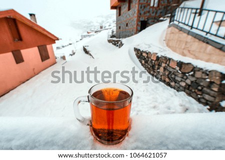 Turkish tea cup on the background of mountain landscape. Travel to Trabzon. Happy morning. A cup of traditional Turkish tea