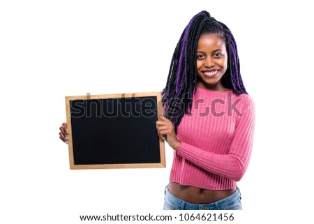 young black girl holding a blackboard
