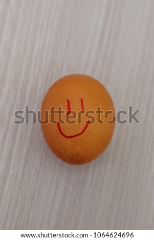egg with a painted smile close up