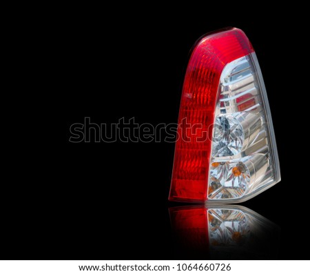 Car tail lights isolated on white with reflection