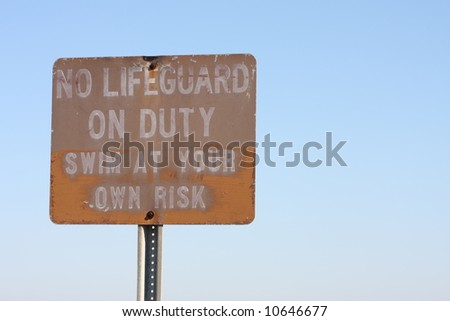Old no lifeguard sign