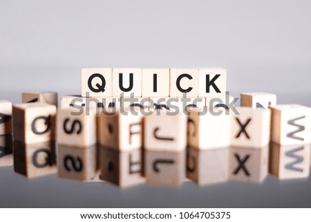 QUICK word cube on reflection