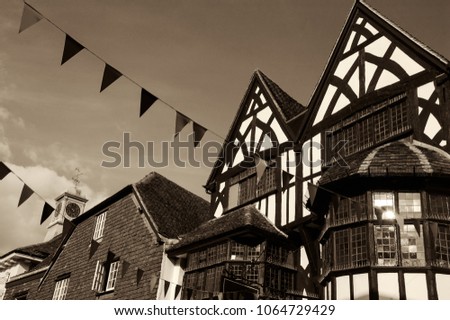 Medieval street in city of Salisbury. England, UK. Sepia photo.