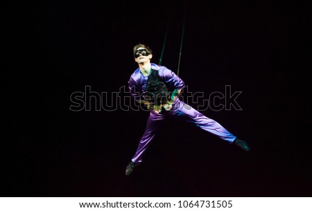 performance of aerialists in the circus