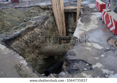Big hole in road made for road repairing works