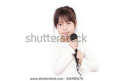 pretty little girl with the microphone in her hand