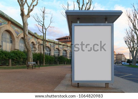 Blank advertisement mock up in a bus stop in the street