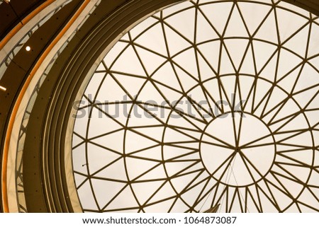 Abstract roof huge window with ornamentical parts.