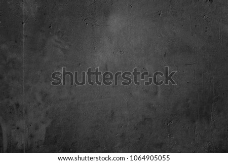 Black grunge background. Dark concrete wall texture. Blackboard. Gray surface. Grange 