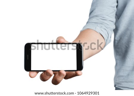 Hand holding black smartphone, isolated on white background