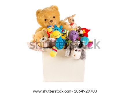 Collection of plush toys in white toys box isolated on white background