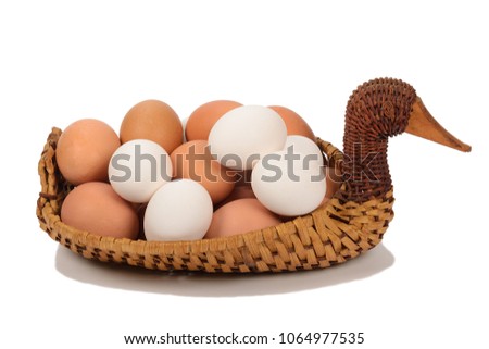 Duck eggs in a wicker basket "Duck"