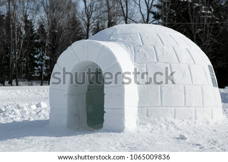 Round Igloo icehouse , Snowhouse yurt, Eskimo shelter built of ice