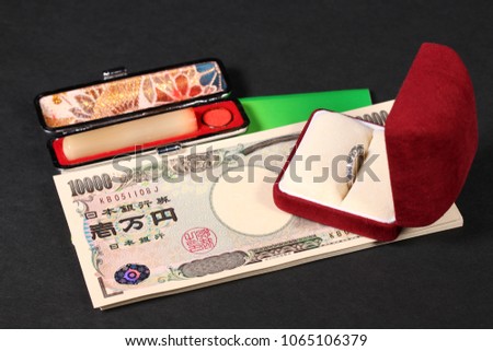 Japanese seal and japanese yen note and ring