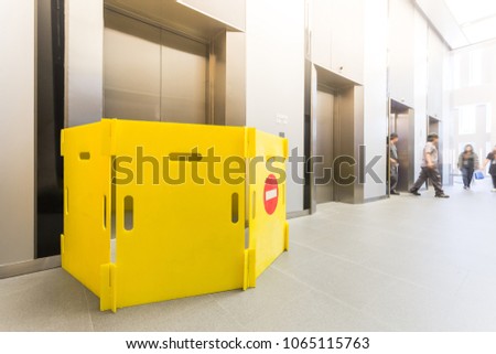 Modern steel elevator repairing  cabins in a business lobby or Hotel, Store, interior, office,perspective wide angle. Three elevators in hotel lobby.