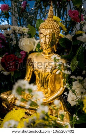 Buddha and flowers Prepare to Songkran Festival.