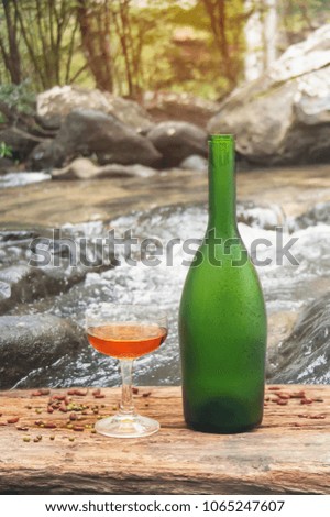 Champagne bottle of Waterfall background