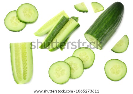 fresh cucumber slices isolated on white background. top view Royalty-Free Stock Photo #1065273611