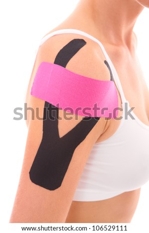 A picture of a special physio tape put on an injured arm muscles over white background