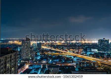 City night view shot. beautiful downtown night light, urban lifestyle Royalty-Free Stock Photo #1065302459
