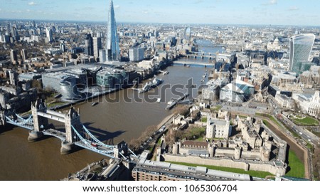 Aerial drone bird's eye view of iconic Tower Bridge in City of London, United Kingdom