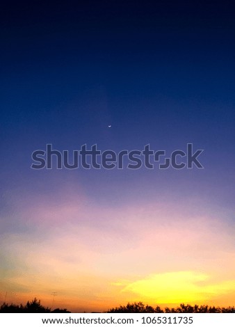 colorful sunset sky with little moon