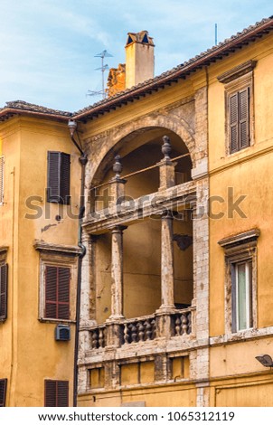 Scenic ancient balcony in Corso Vannucci, main street of Perugia, Italy