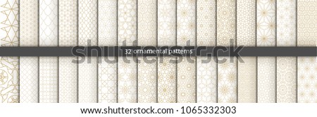 Super Big set of 32 oriental patterns. White and gold background with Arabic ornaments. Patterns, backgrounds and wallpapers for your design. Textile ornament. Vector illustration. Royalty-Free Stock Photo #1065332303